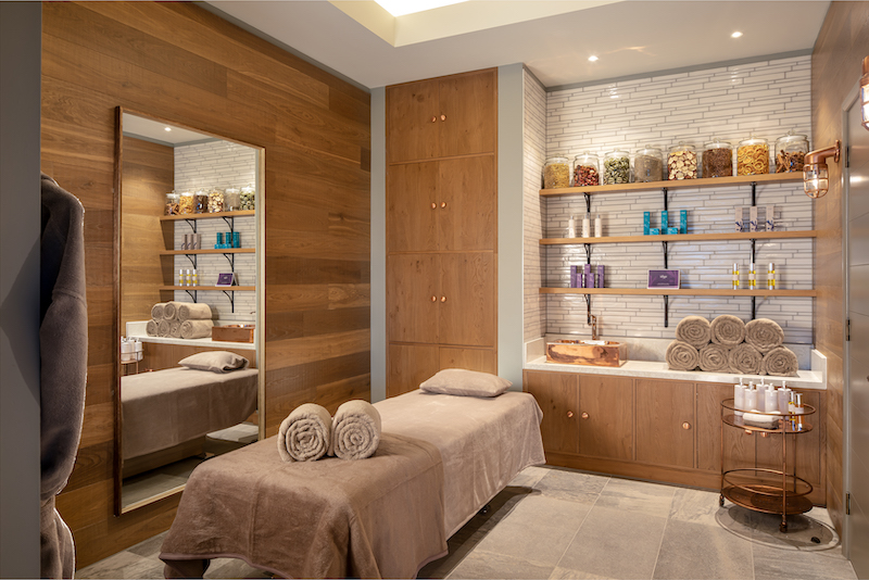 a spa treatment room in beige tones
