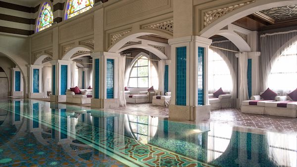swimming pool with arches in luxury spa