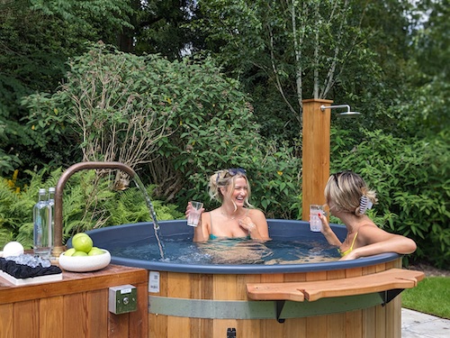 Two women in outdoor hot tub