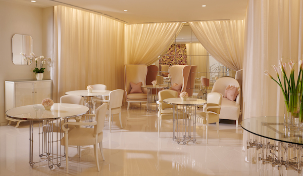 Luxury spa lounge with plush tables and white billowing curtains
