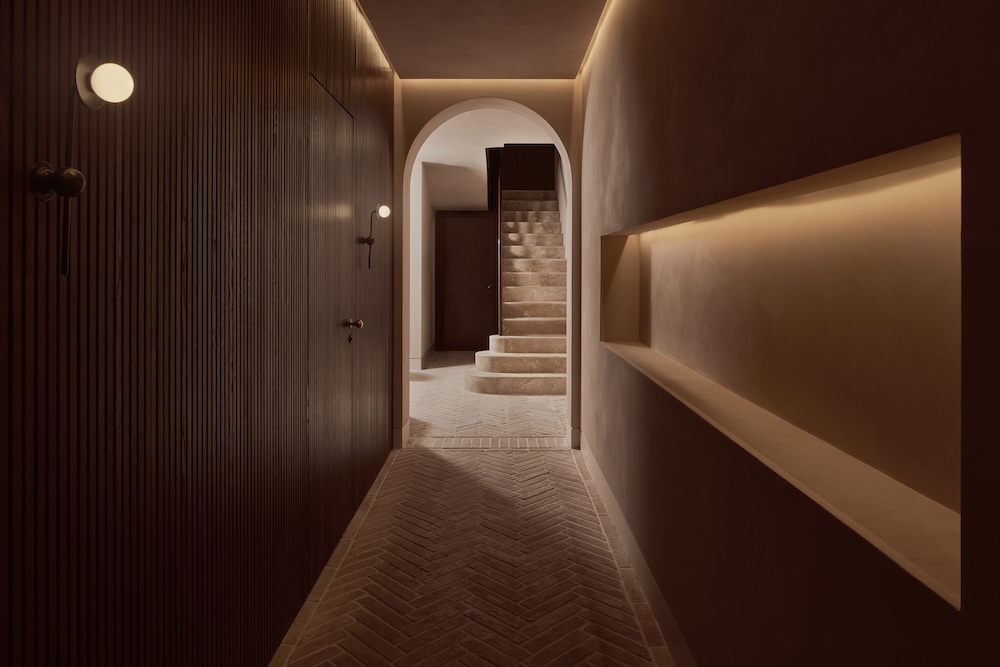 A darkly lit corridor in a spa