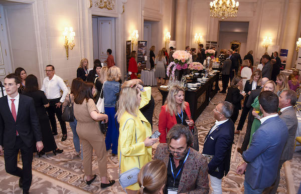 guests at break out sessions at a conference in Paris