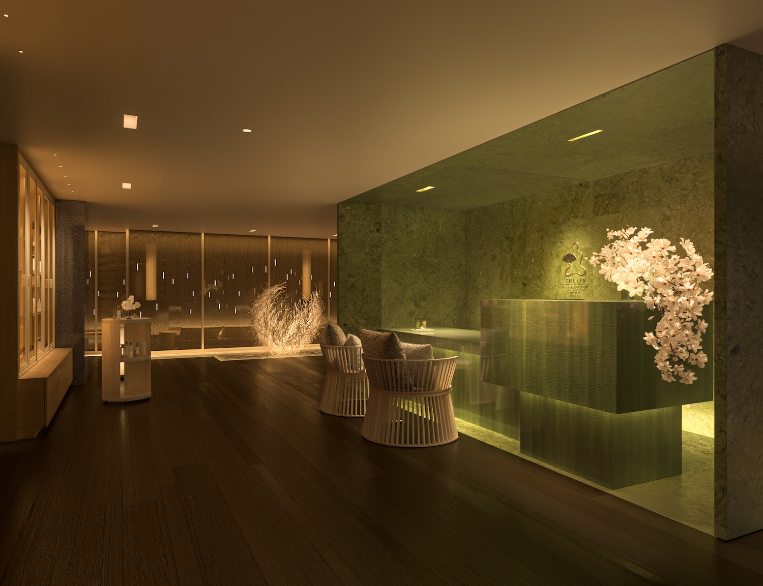 a darlky lit spa reception with a green wall