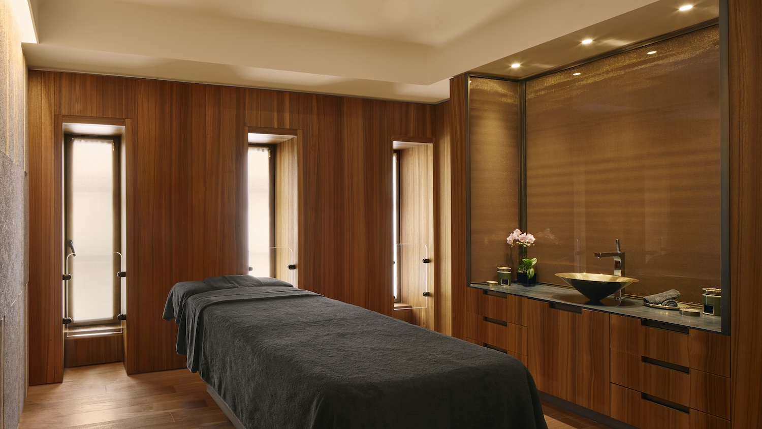A wood panelled spa treatment room