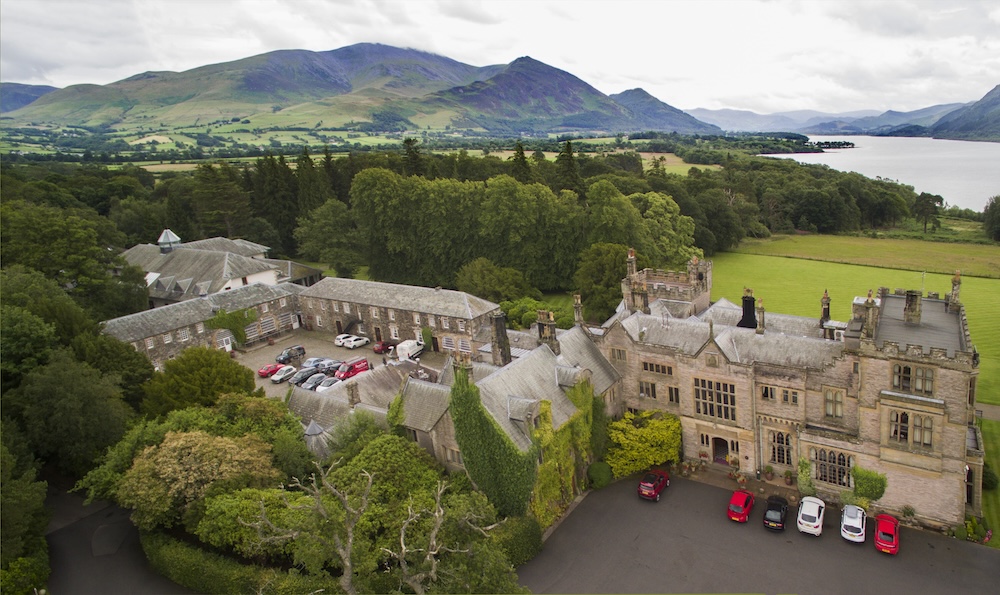 an english hotel with the lake district in the background