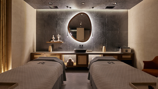 Spa treatment room with two treatment beds