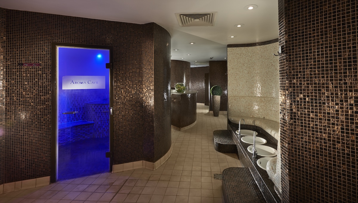 A spa area with tiled walls and ice room