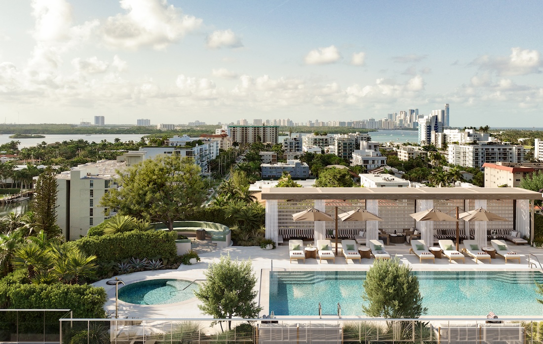 An outdoor rooftop pool and hot tub