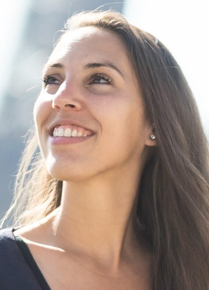 Smiling woman with long brown hair