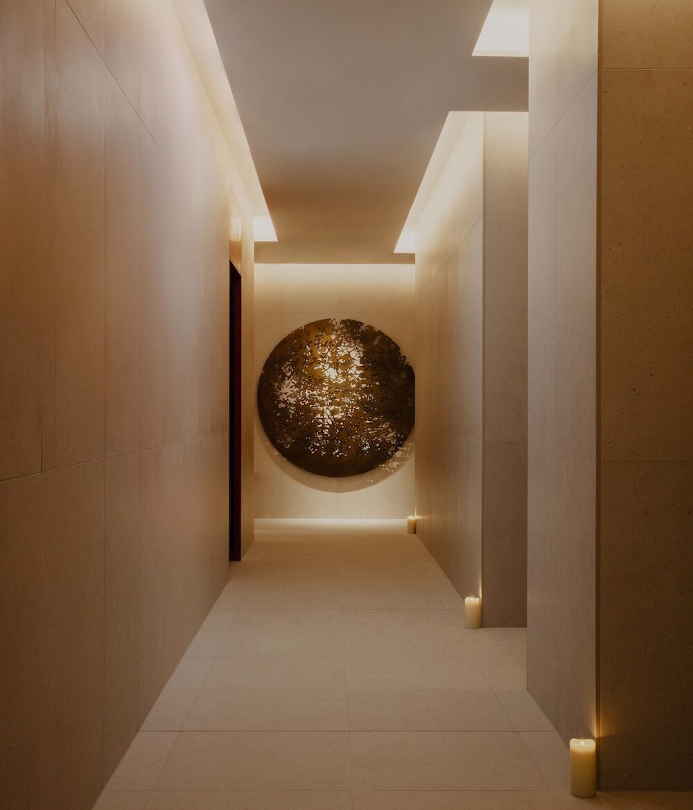 A hotel corridor leading to a spa