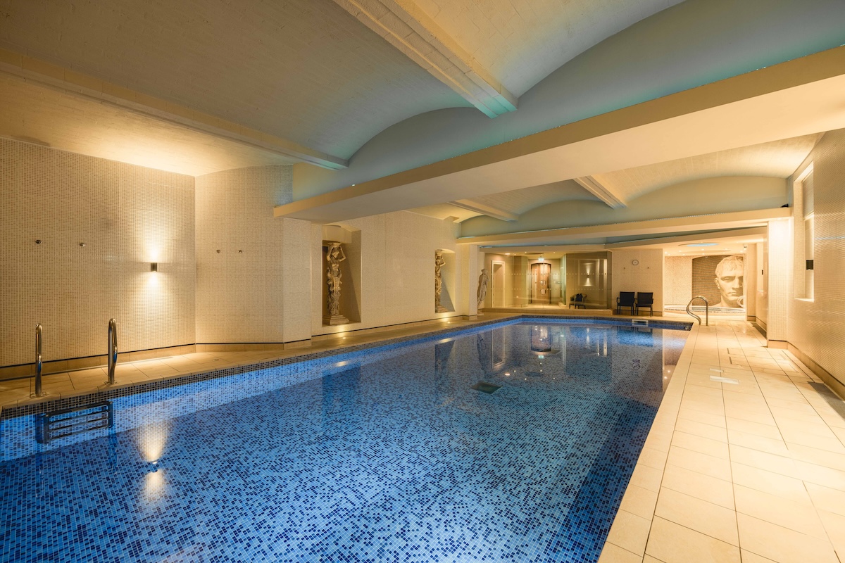 a subterranean swimming pool in a spa setting