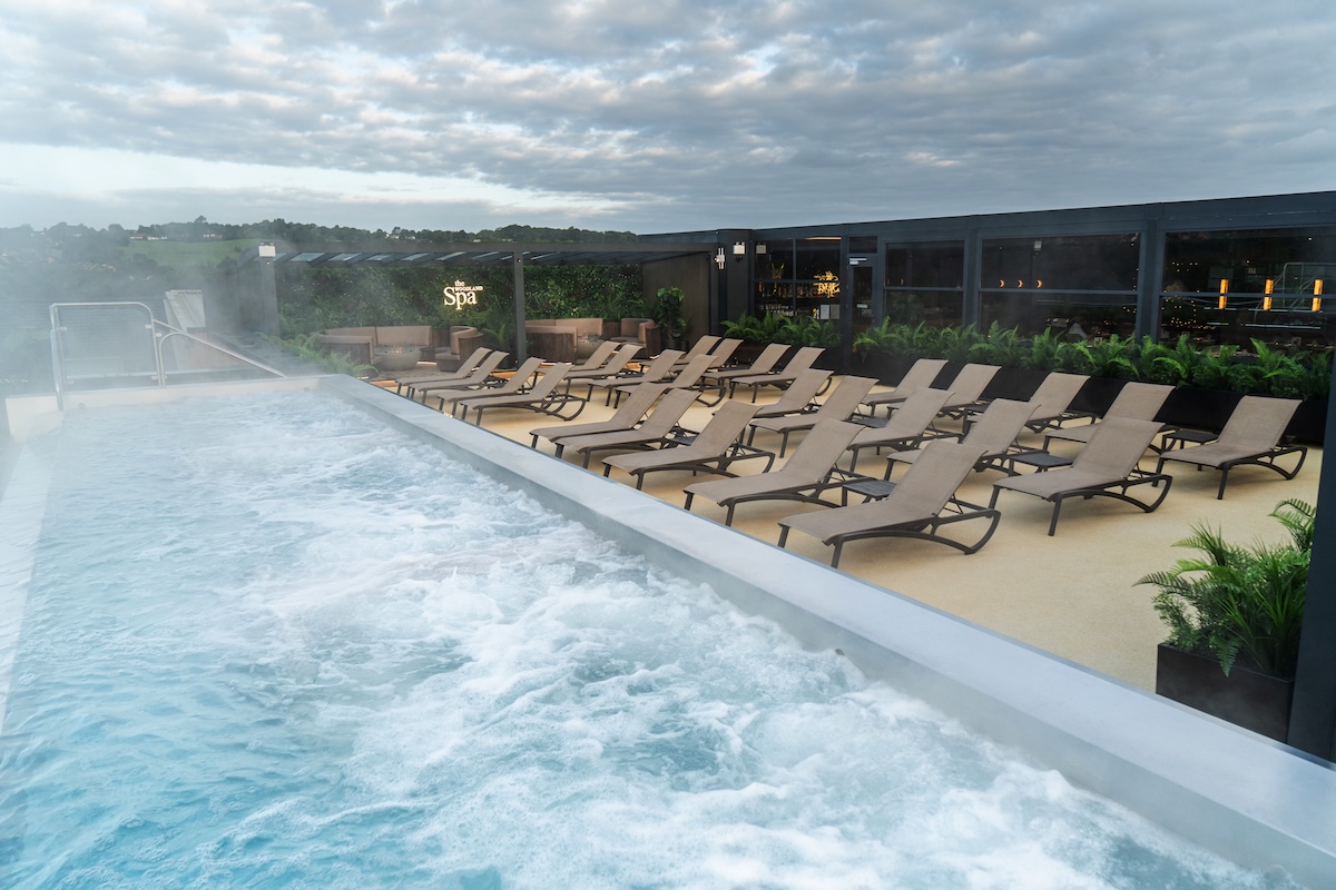 An outdoor rooftop pool in a spa