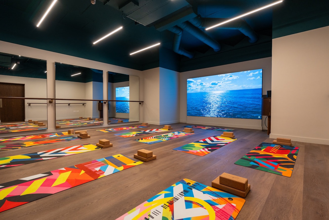 Studio space with yoga mats laid out
