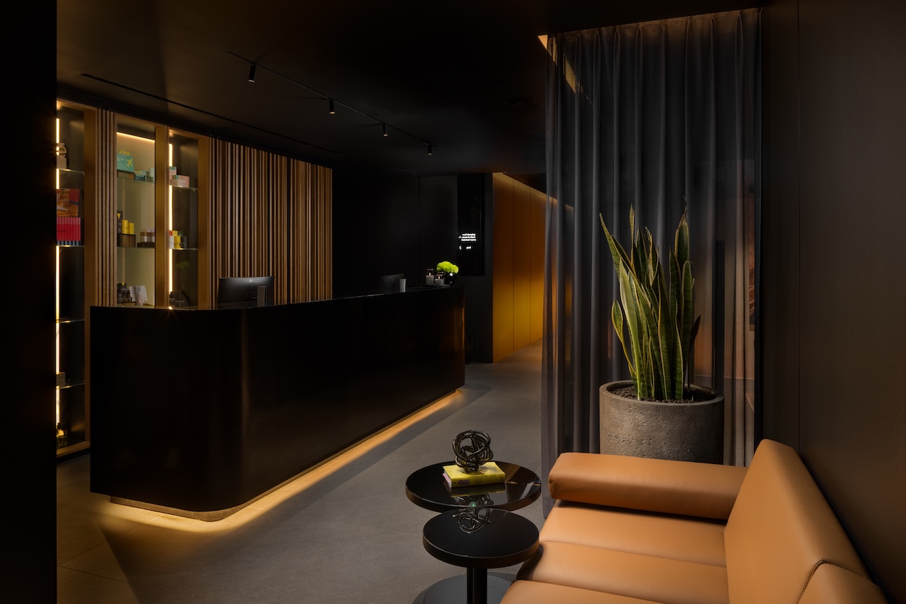 Reception area in darkly lit subterranean spa