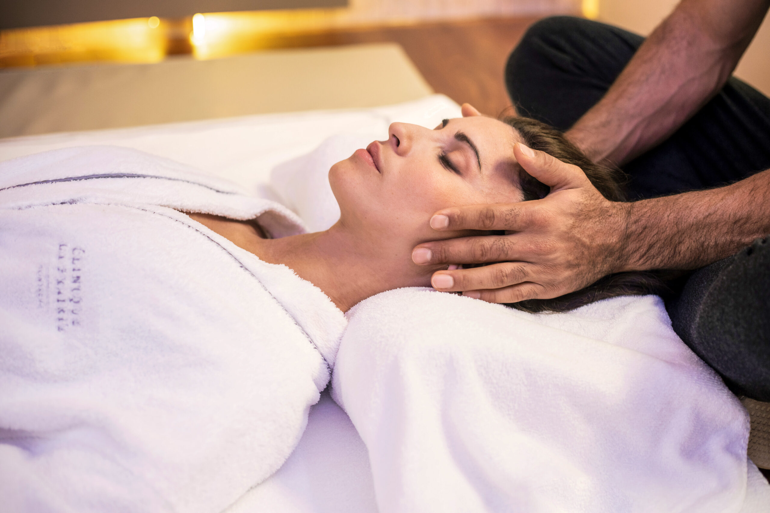 A woman being head massaged - Clinique La Prairie launches Epinome and Advanced Longevity Diagnostics