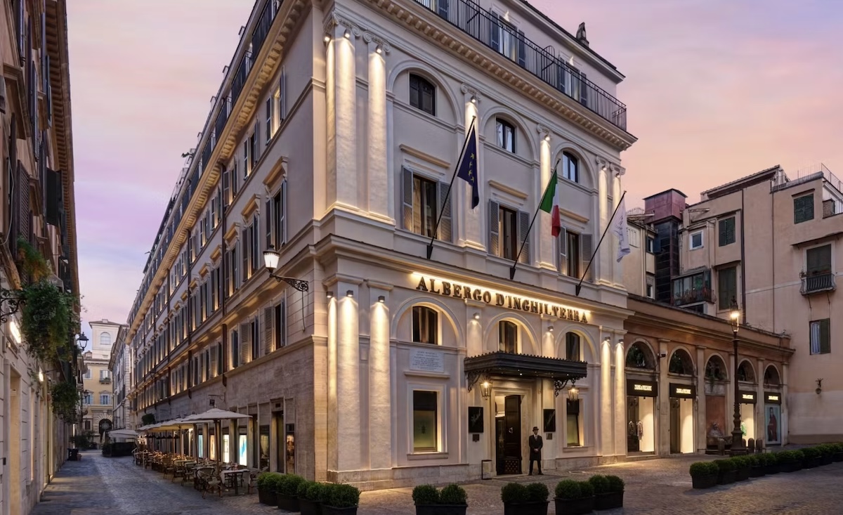 exterior view of an historic Italian hotel at sunset