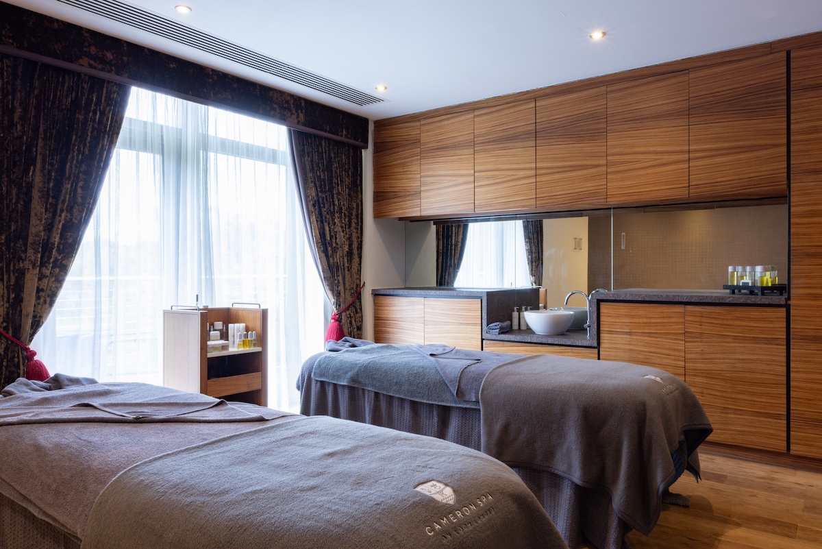 Two treatments beds in a spa treatment room