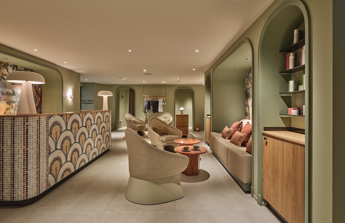 Reception area with mosaic tiles desk in high end spa