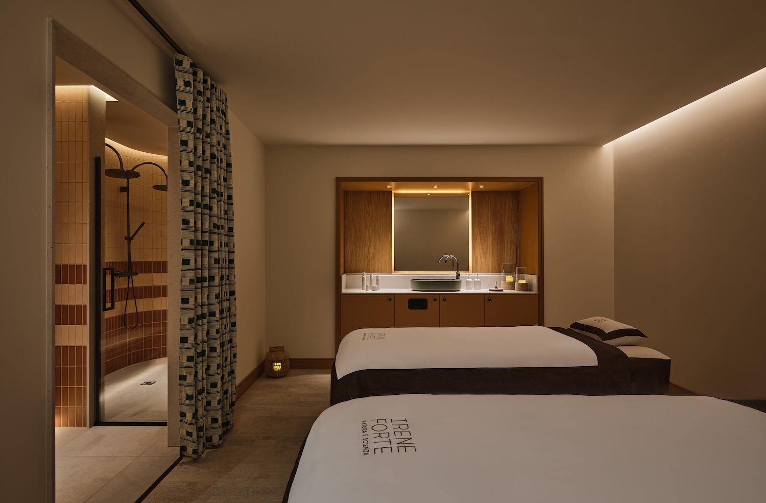 Treatment room in a spa with two treatment beds