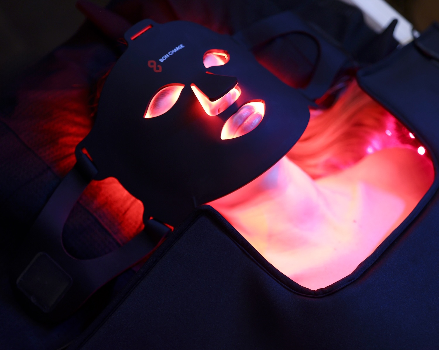 Woman wearing and LED therapy face mask