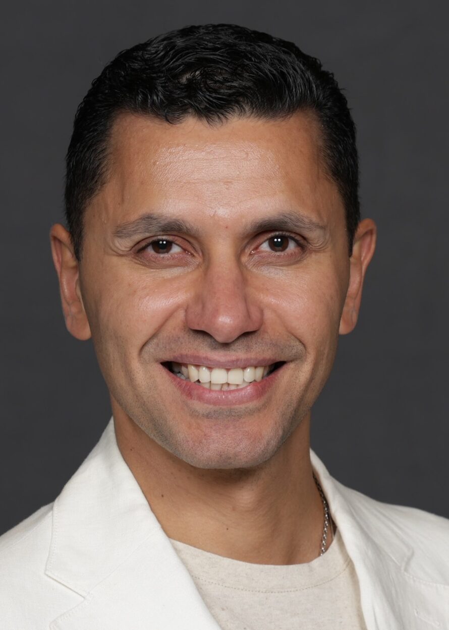 Man in white tshirt and jacket