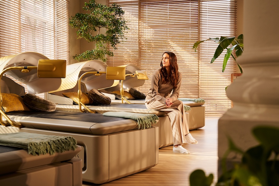 Woman sitting on Mind Oasis by Rituals technology