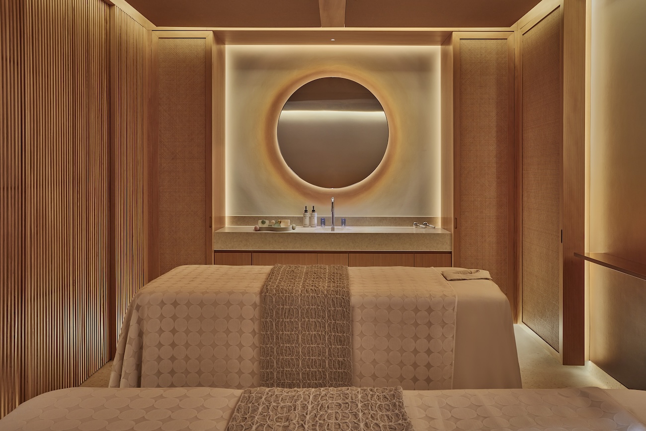 Treatment room is a spa with two therapy beds