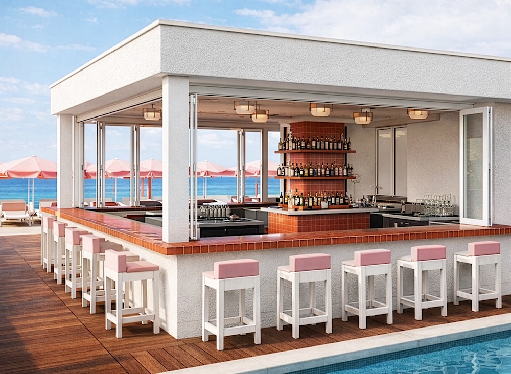 Rooftop bar next to a pool overlooking the sea