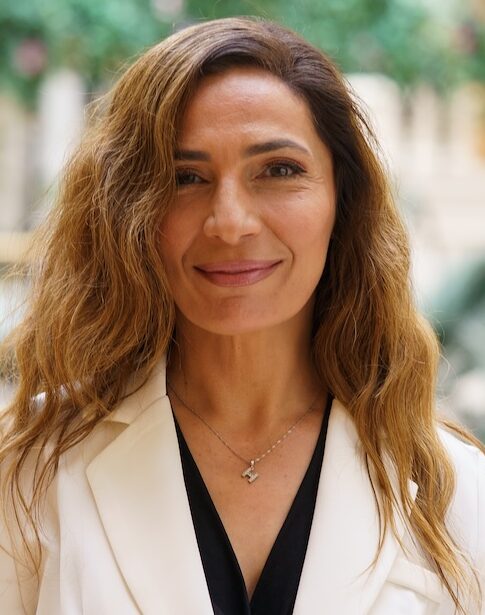Woman in white blazer