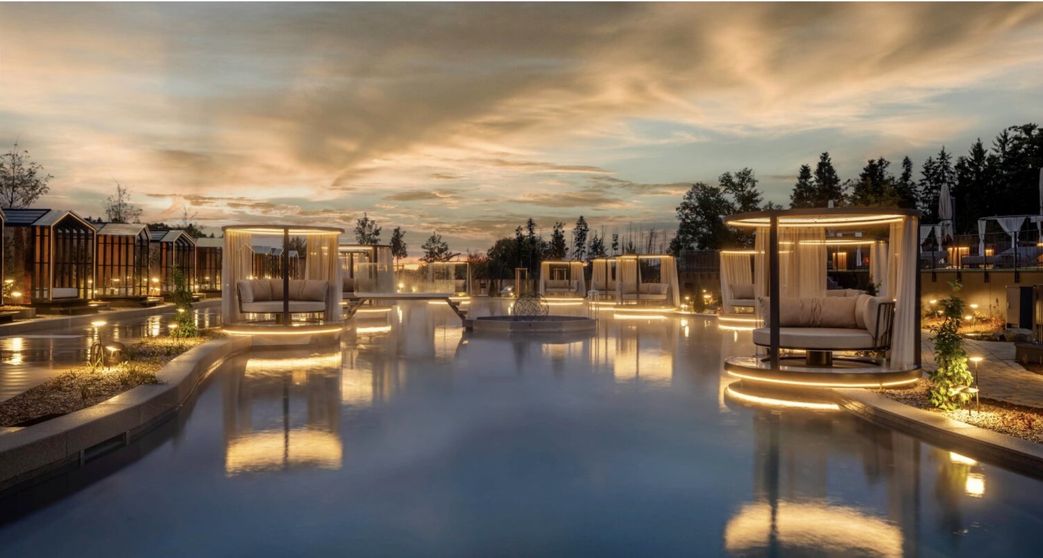hanging chairs across a lake in a spa