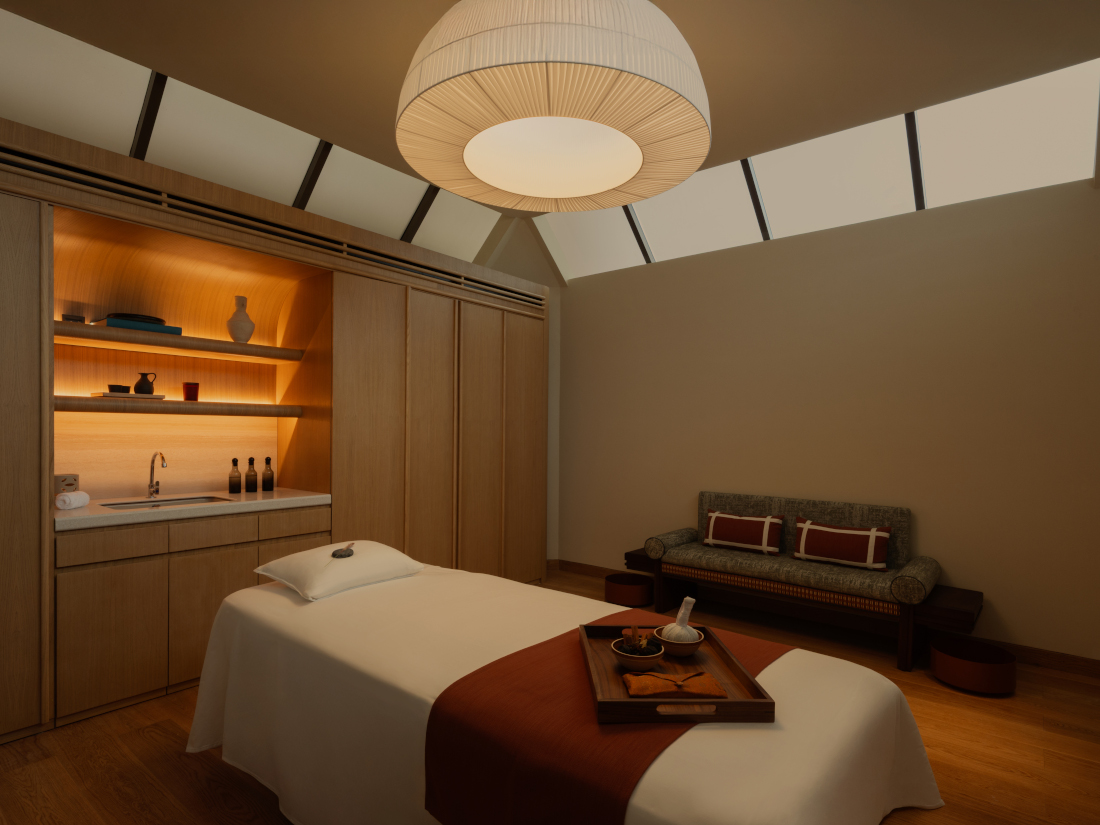 Treatment room is a spa with one therapy bed