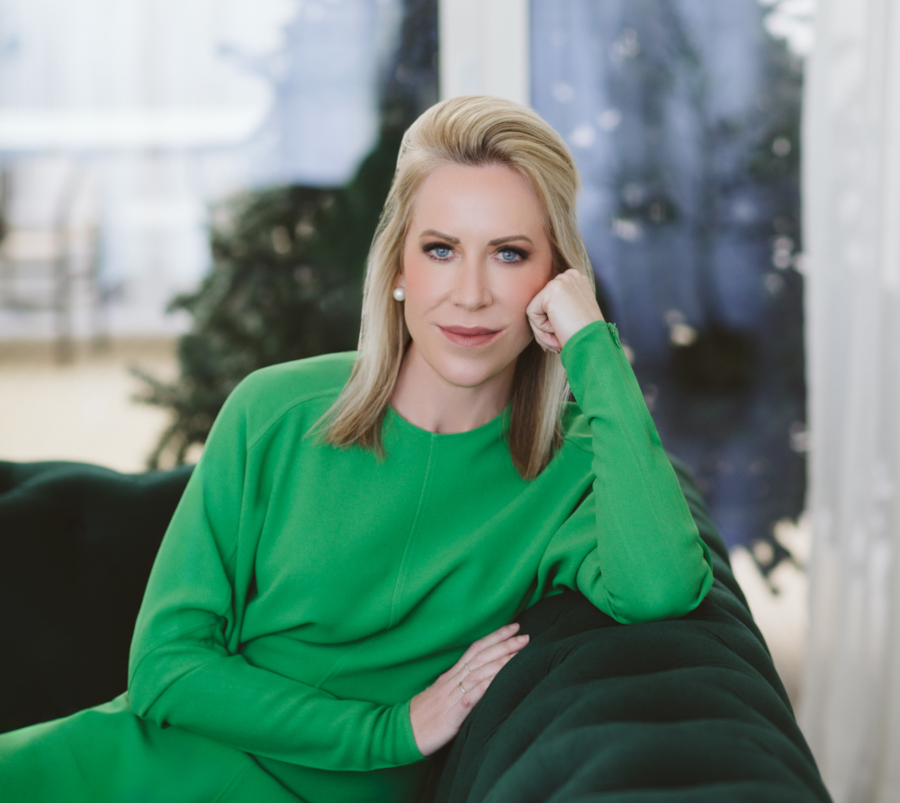 Posed photo pf blonde woman in vibrant green
