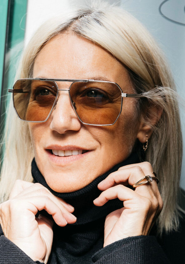 Headshot of woman in fashionable sunglasses